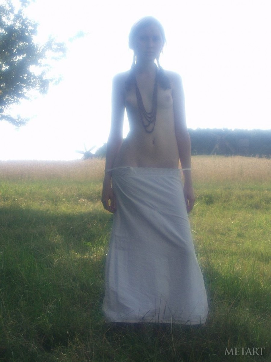 Sexy babe is walking with the horse