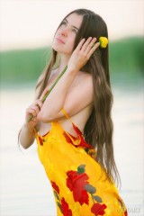 Wonderful girl is having solo in the river