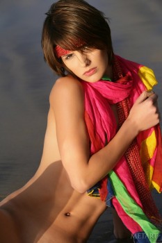 Short haired cutie posing on the beach