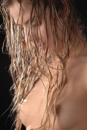 Playing naked int he rain brings a smile to her face photo 4