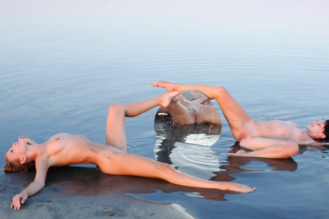 Sexy chicks pose naked in front of the mirror photo 17