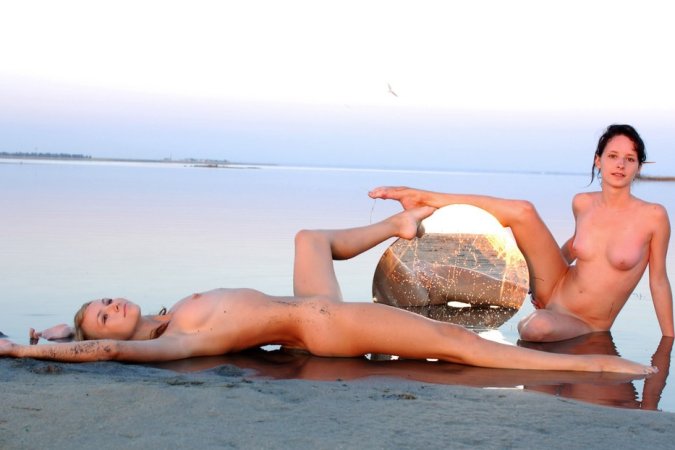 Sexy chicks pose naked in front of the mirror photo 20