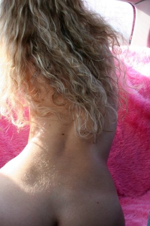 Cute chick is demonstrating naked body in the car photo 7