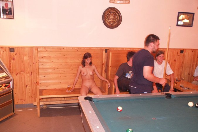 Daring babe walks around in public naked photo 15