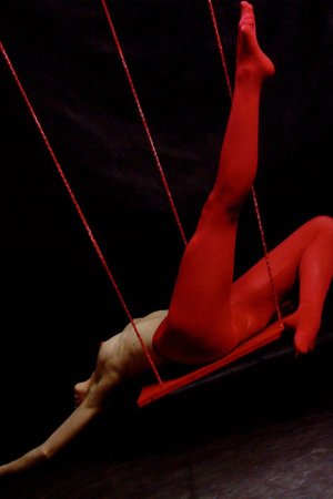 Sweetie poses and orgasms on the swing. photo 9