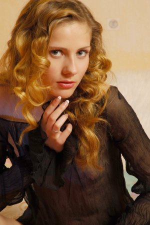 Gentle girl is enjoying solo session photo 18