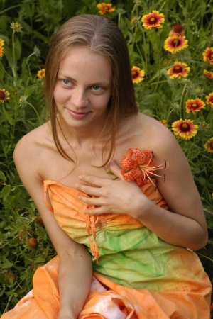 Cute young lady is demonstrating her body photo 1