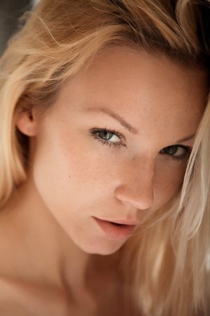 Skinny blonde is enjoying solo in the bathroom photo 2