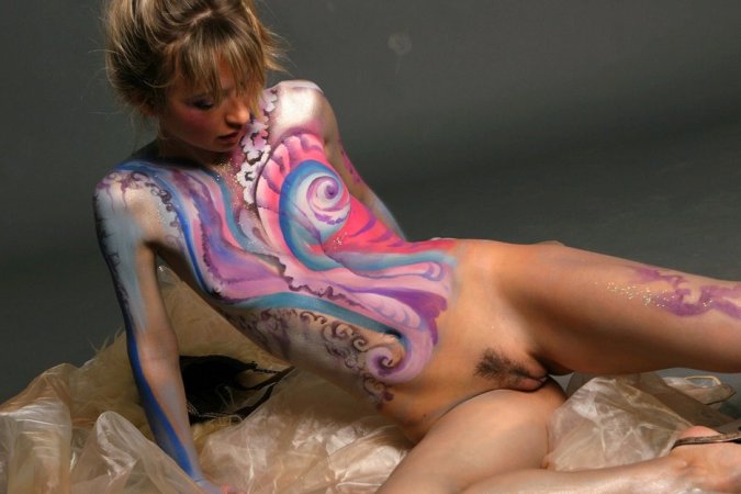 Painted babe is demonstrating solo skills photo 14