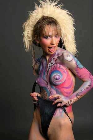 Painted babe is demonstrating solo skills photo 17