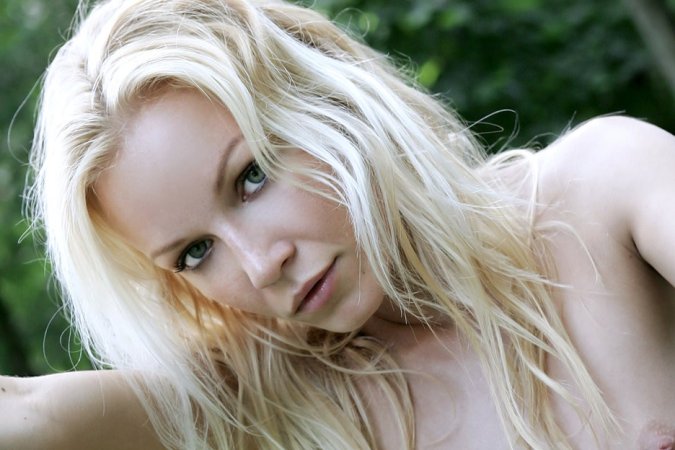 Sexy blonde is having solo in forest photo 18