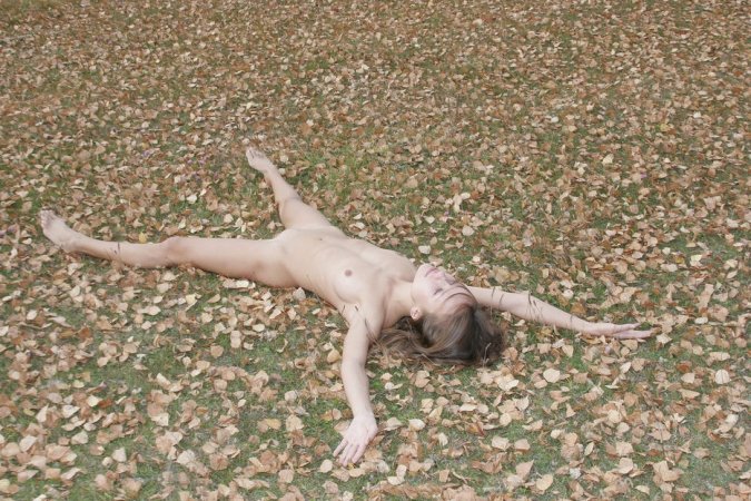 Naked babe walks the autumn forest photo 16