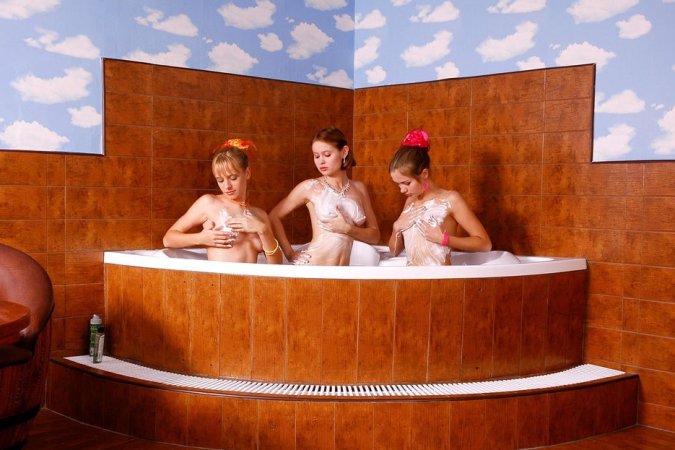 Lesbian trio caresses one another in a bath photo 16