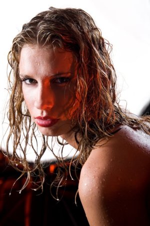Cutie poses in her sexy wet blouse photo 12