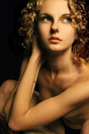 Awesome blonde in the black studio photo 2