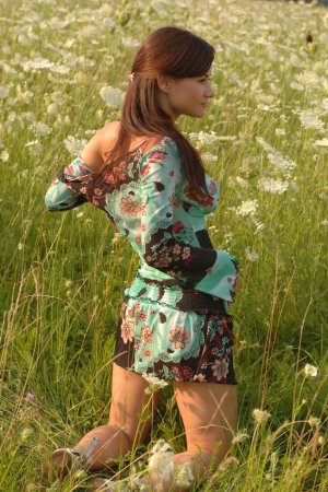 Naked chick lies down in the middle of the meadow. photo 7