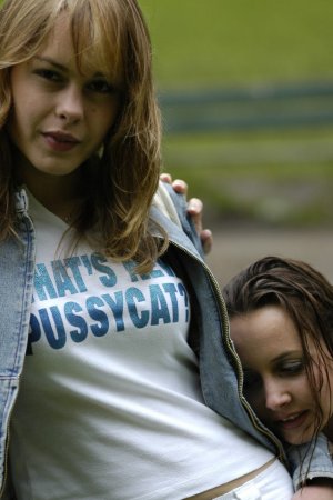 Kinky lesbians are taking off clothes and having fun photo 4
