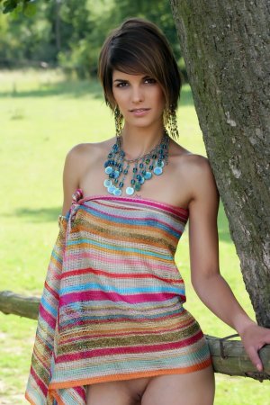 Sweetie in beads spends time in the park. photo 2