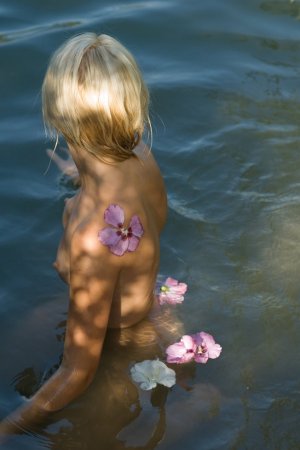 Diva swims naked in the local river. photo 15