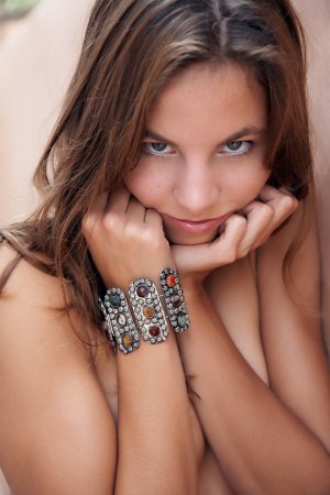 Yummy cutie poses in a bracelet only photo 9