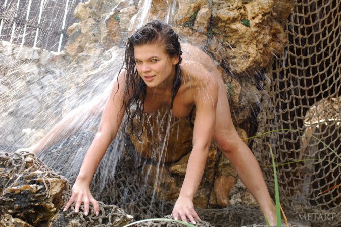 Fit, ripped hottie naked in a waterfall photo 10