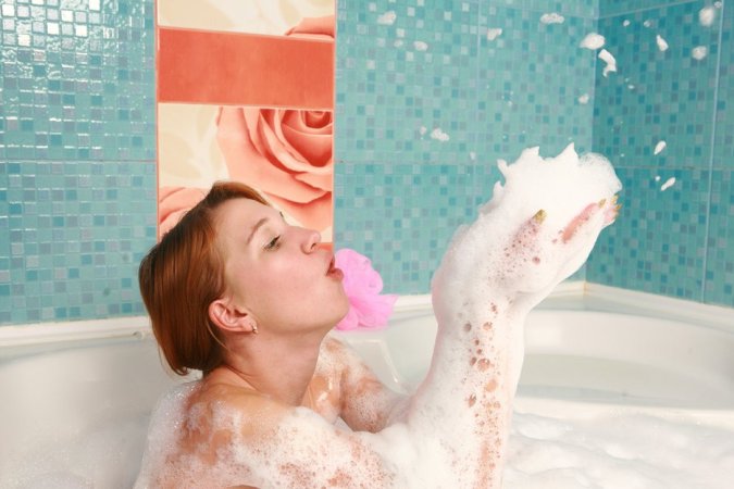 Two chicks are enjoying closeness in the bathtub photo 14