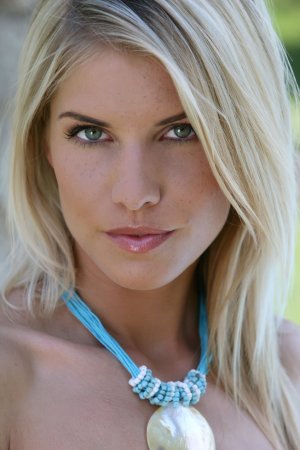 Naked cutie fools around at poolside photo 7