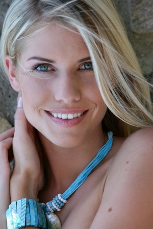 Naked cutie fools around at poolside photo 12
