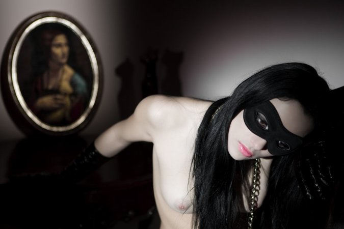 Elegant lady posing in her black lingerie photo 20
