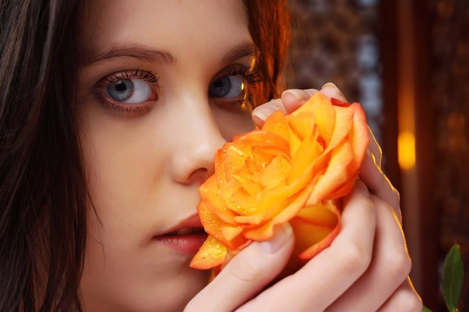 Naked cutie plays with a yellow rose. photo 5
