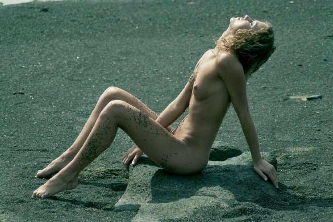 Curly haired blondie posing on the beach photo 6