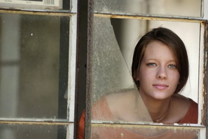 Brunette performs striptease in the isolated place photo 16