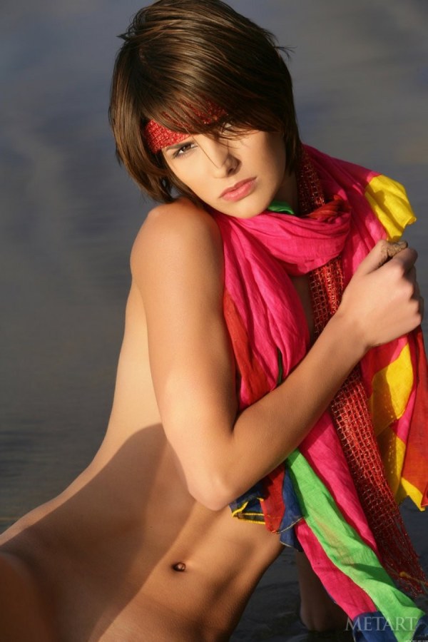 Demi A – Short haired cutie posing on the beach