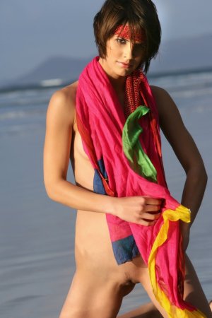 Short haired cutie posing on the beach photo 10