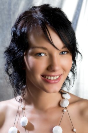 Sexy brunette having small tits is demonstrating solo photo 18