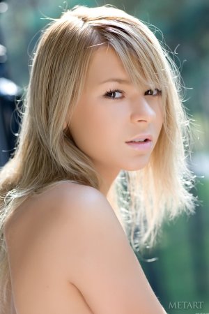 Young blonde is feeling great touching herself photo 5