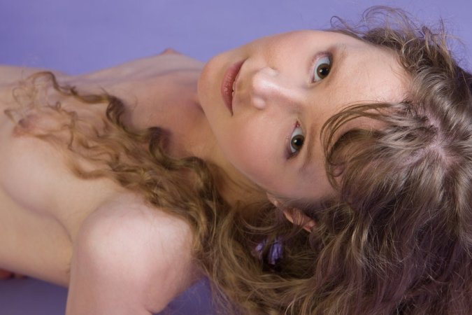 Skinny teen is demonstrating her sophisticated body photo 2