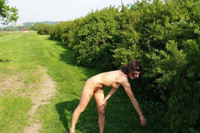 Horny brunette is having fun on the grass photo 9