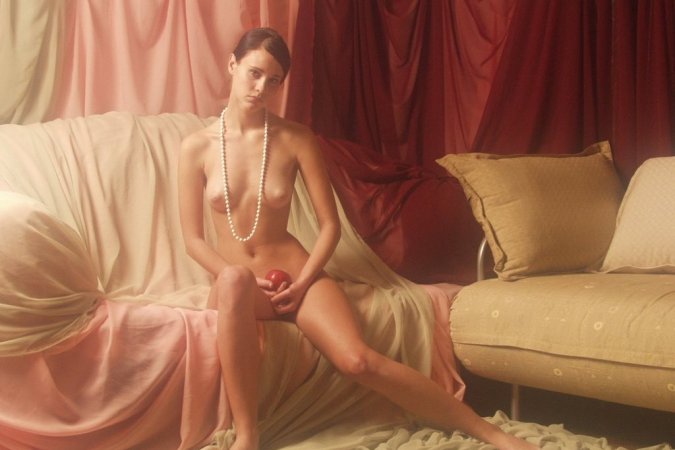 Artistic nude wearing just a pearl necklace photo 2