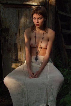 Babe with natural small tits caresses pussy outdoors. photo 1