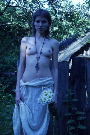 Babe with natural small tits caresses pussy outdoors. photo 17
