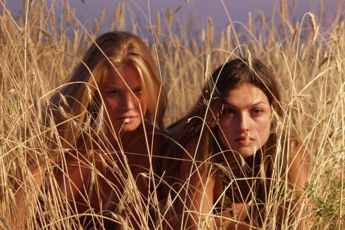 Lesbo chicks play with each other in the field. photo 3