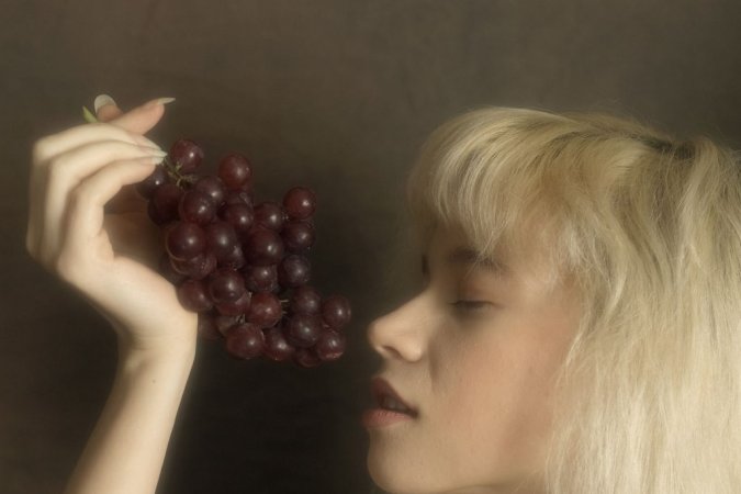 Blonde sweetie caresses naked body with fruits. photo 9