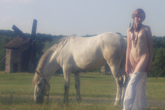 Sexy babe is walking with the horse photo 6