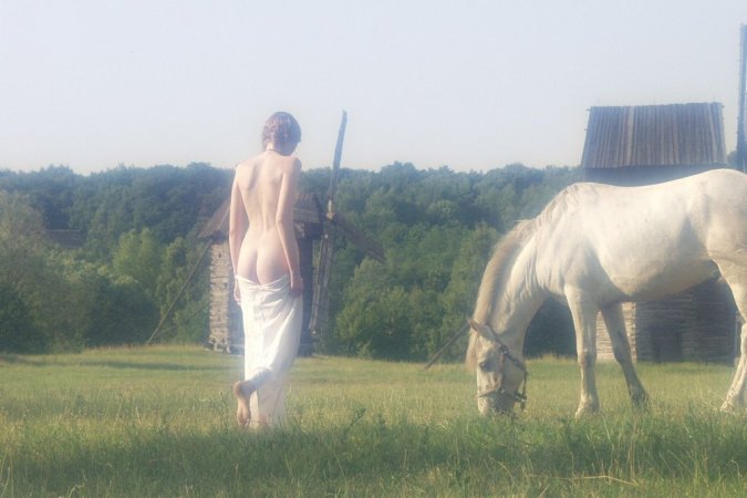 Sexy babe is walking with the horse photo 8