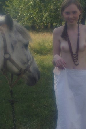Sexy babe is walking with the horse photo 14