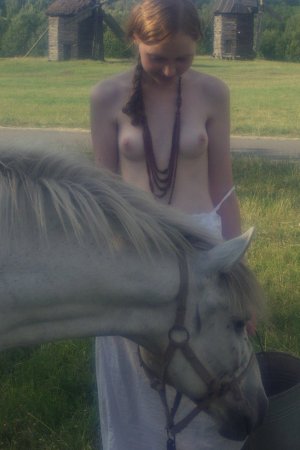 Sexy babe is walking with the horse photo 17