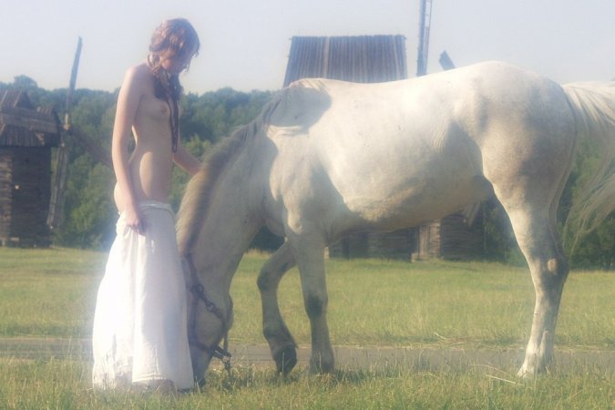 Sexy babe is walking with the horse photo 18