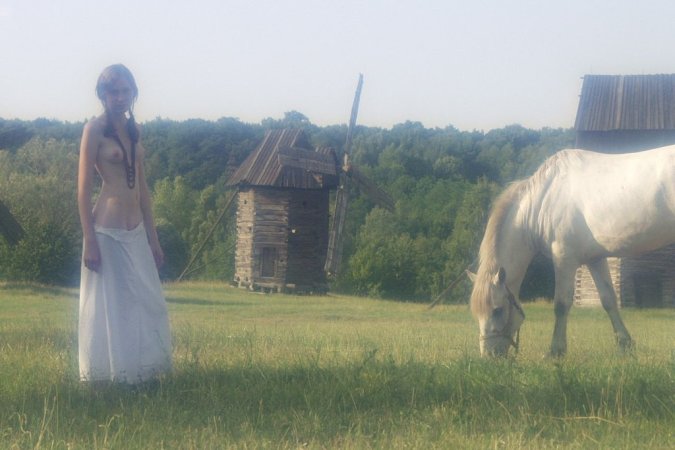 Sexy babe is walking with the horse photo 19