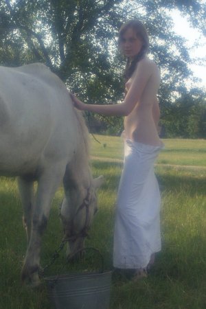 Sexy babe is walking with the horse photo 20